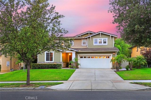3973 Coast Oak Cir, Chino Hills, CA 91709 - craftsman inspired home featuring concrete driveway, an attached garage, stone siding, and a front yard