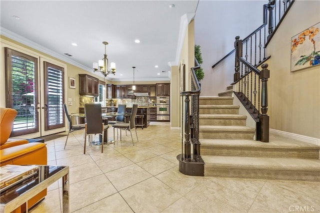 3973 Coast Oak Cir, Chino Hills, CA 91709 - staircase featuring tile patterned floors, a notable chandelier, and a healthy amount of sunlight