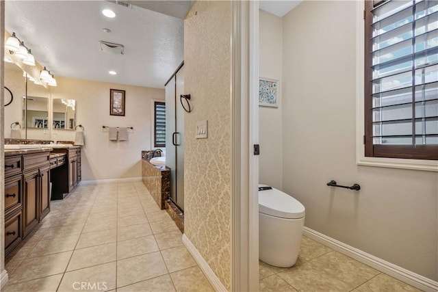 3973 Coast Oak Cir, Chino Hills, CA 91709 - bathroom with a garden tub, vanity, baseboards, toilet, and tile patterned flooring