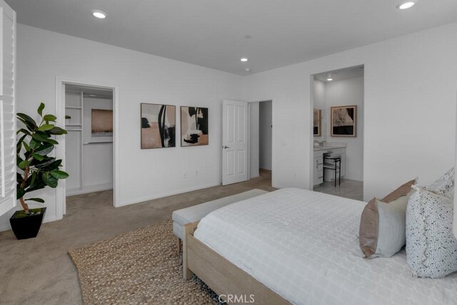 8000 7th St, Downey, CA 90241 - carpeted bedroom with baseboards, a spacious closet, and recessed lighting