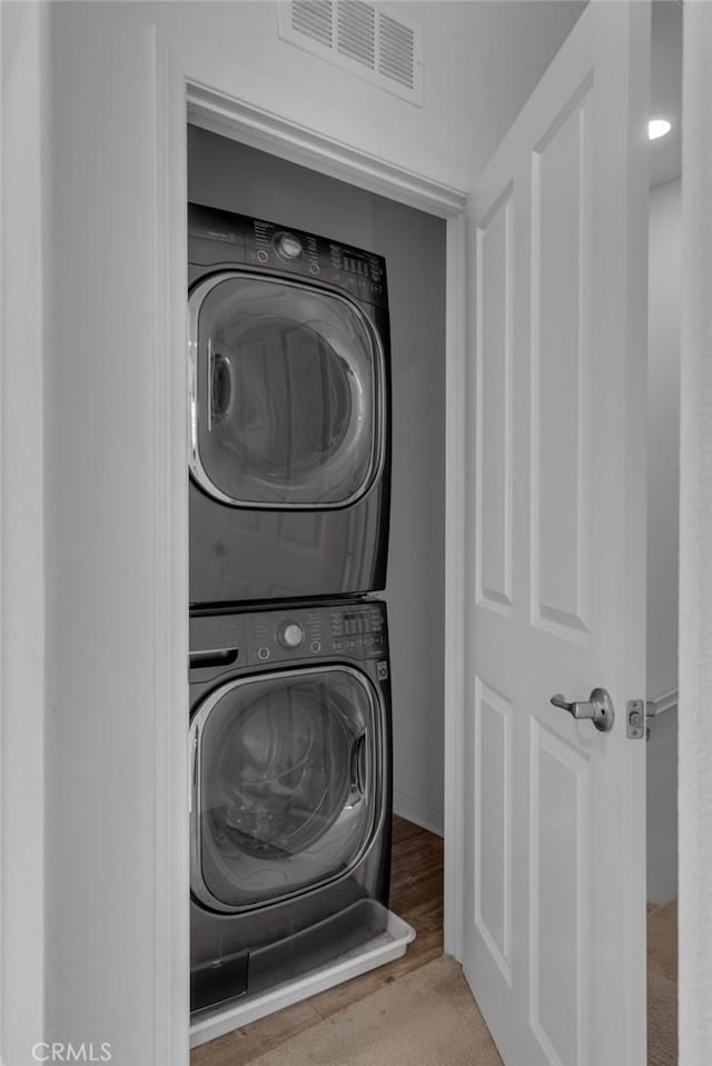 8000 7th St, Downey, CA 90241 - laundry area featuring visible vents and stacked washer / drying machine