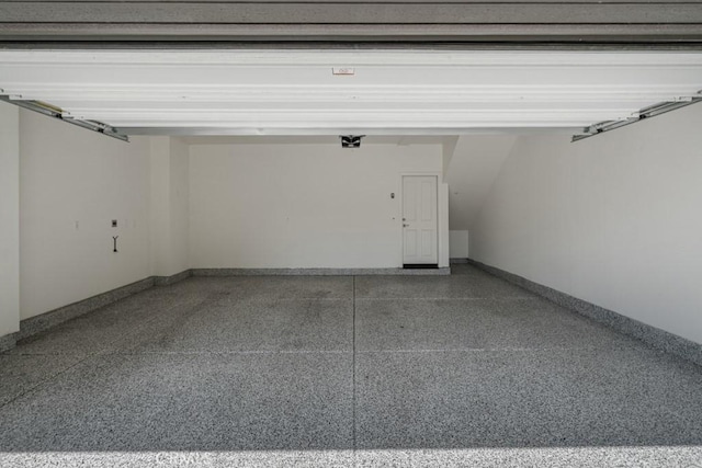 8000 7th St, Downey, CA 90241 - garage featuring baseboards