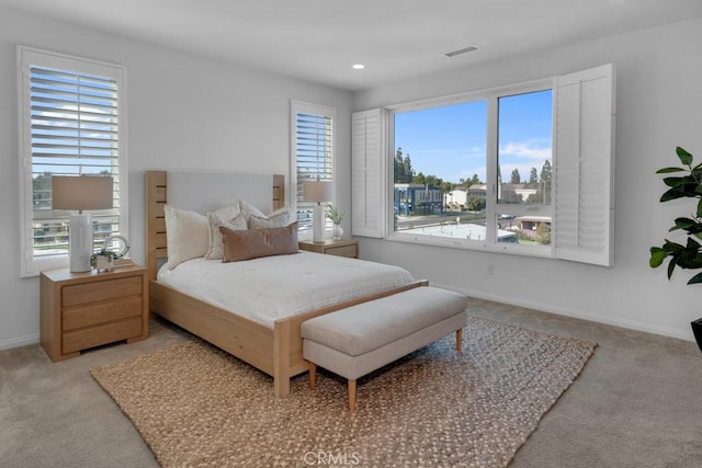 8000 7th St, Downey, CA 90241 - carpeted bedroom featuring recessed lighting, baseboards, visible vents, and multiple windows