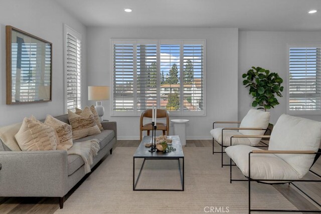 8000 7th St, Downey, CA 90241 - living area featuring baseboards, recessed lighting, and wood finished floors