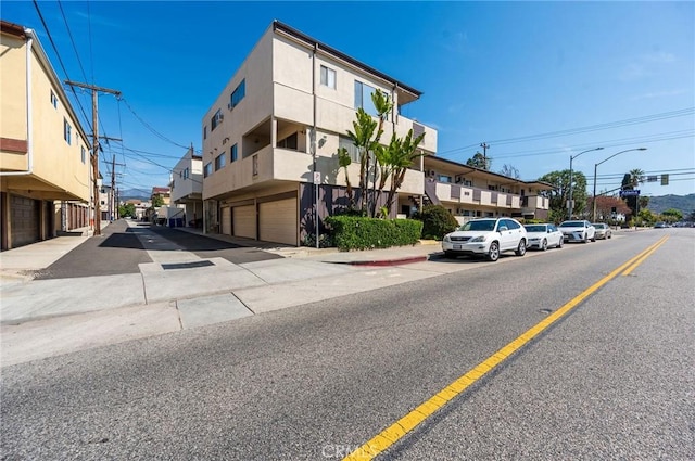 1015 E Wilson Ave, Glendale, CA 91206 - view of asphalt street with street lights, sidewalks, and curbs