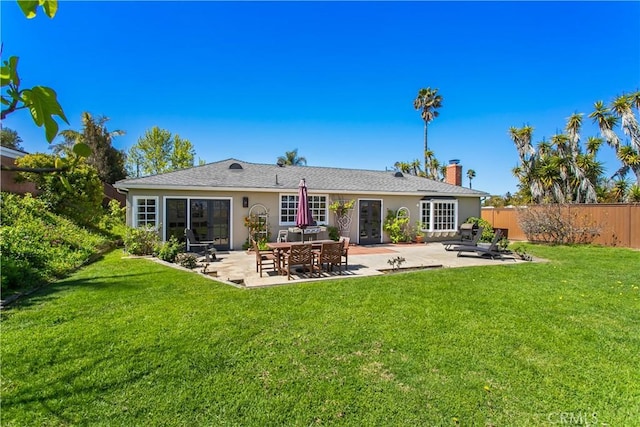 2964 Mountain View Dr, Laguna Beach, CA 92651 - rear view of property featuring fence, a chimney, a yard, and a patio