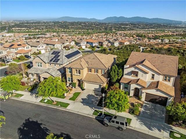bird's eye view with a residential view and a mountain view