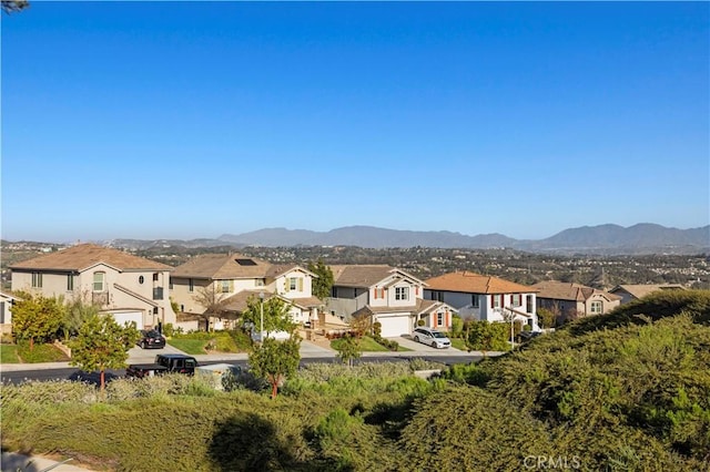 property view of mountains with a residential view