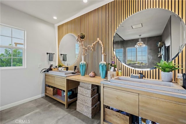 full bathroom with recessed lighting, vanity, finished concrete flooring, and baseboards