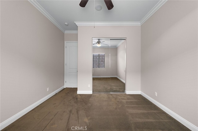unfurnished bedroom featuring ornamental molding, a closet, carpet flooring, and baseboards