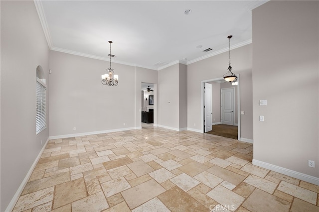 unfurnished room featuring crown molding, an inviting chandelier, stone tile flooring, and baseboards