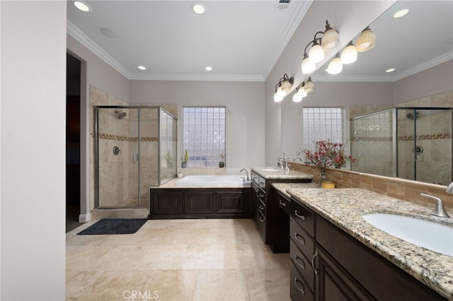 full bathroom with a garden tub, a shower stall, recessed lighting, and a sink
