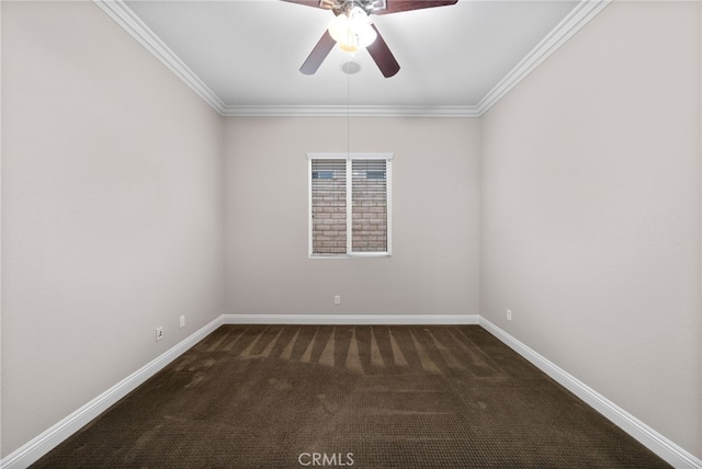 empty room with carpet, a ceiling fan, crown molding, and baseboards