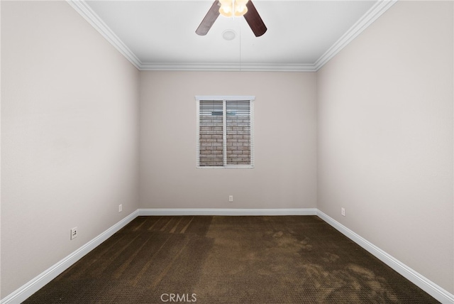 empty room with baseboards, ceiling fan, crown molding, and carpet