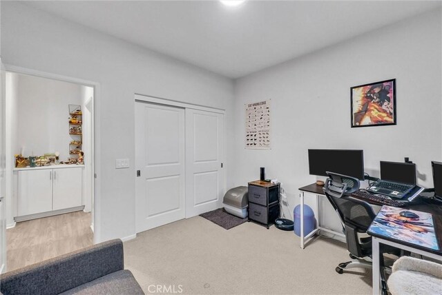 office with carpet floors and baseboards