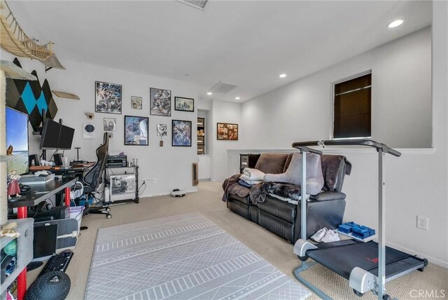 exercise room featuring carpet and recessed lighting
