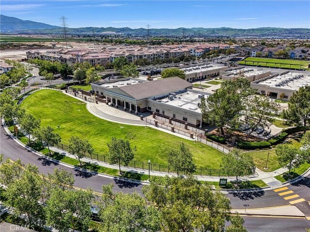 aerial view of residential area with a mountain backdrop