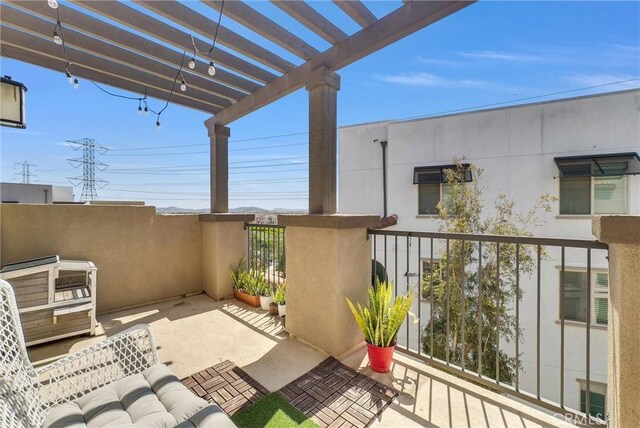view of patio / terrace featuring a pergola