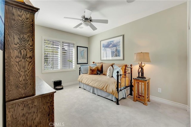 6288 Sunnyside Cir, Huntington Beach, CA 92648 - bedroom with light carpet, baseboards, and a ceiling fan