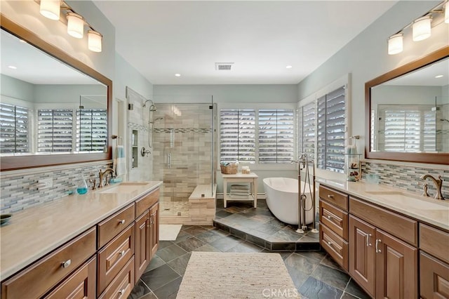 6288 Sunnyside Cir, Huntington Beach, CA 92648 - bathroom featuring a stall shower, a sink, and plenty of natural light