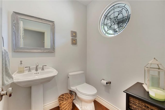 6288 Sunnyside Cir, Huntington Beach, CA 92648 - half bath with toilet and baseboards