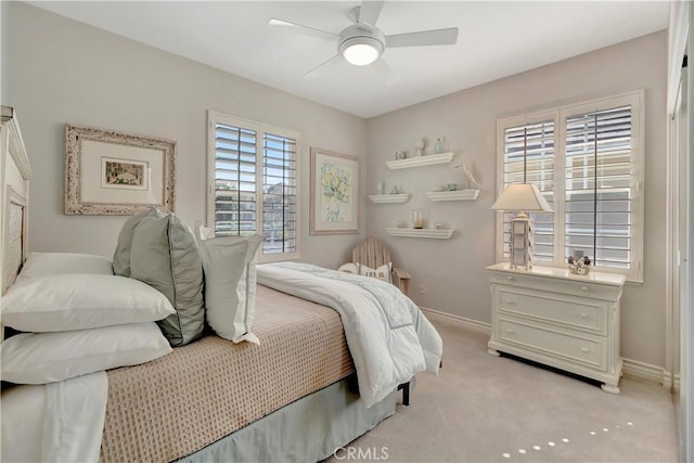 6288 Sunnyside Cir, Huntington Beach, CA 92648 - bedroom with light colored carpet, baseboards, and a ceiling fan