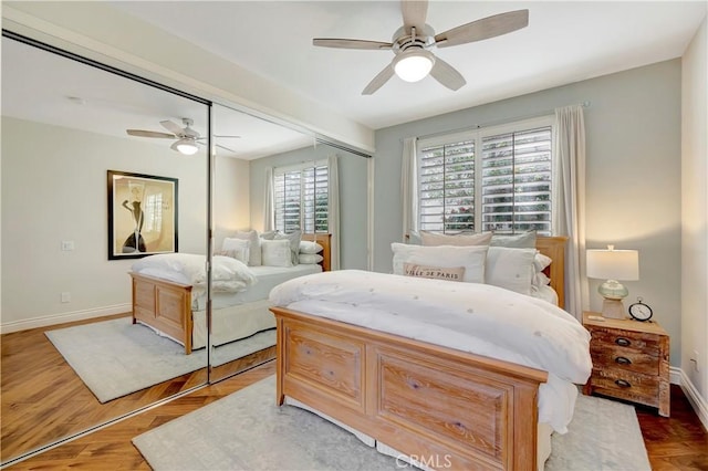 6288 Sunnyside Cir, Huntington Beach, CA 92648 - bedroom featuring ceiling fan, a closet, baseboards, and wood finished floors