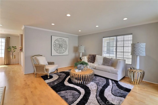 living area with recessed lighting, wood finished floors, crown molding, and baseboards