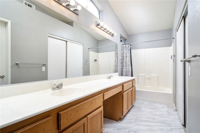 full bathroom featuring shower / bath combo, visible vents, a sink, double vanity, and marble finish floor