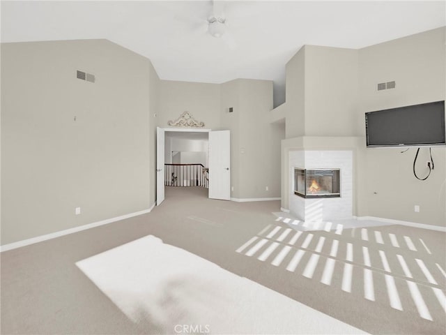 125 Heath Meadow Pl, Simi Valley, CA 93065 - unfurnished living room featuring carpet floors, high vaulted ceiling, and a multi sided fireplace