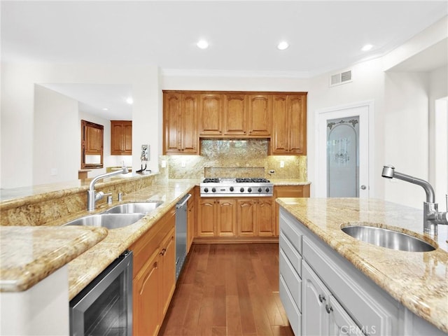 125 Heath Meadow Pl, Simi Valley, CA 93065 - kitchen with beverage cooler, appliances with stainless steel finishes, light stone counters, dark wood-style flooring, and recessed lighting