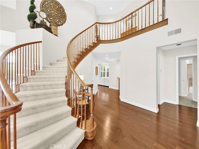 125 Heath Meadow Pl, Simi Valley, CA 93065 - staircase with wood finished floors, a high ceiling, and recessed lighting