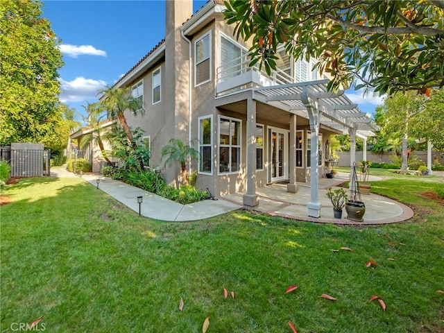 125 Heath Meadow Pl, Simi Valley, CA 93065 - rear view of house featuring a pergola, stucco siding, a patio, a chimney, and a balcony