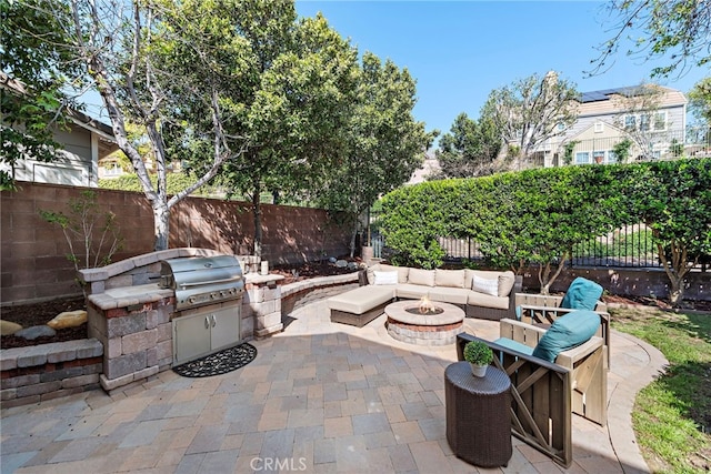 18 Beacon, Ladera Ranch, CA 92694 - fenced backyard with an outdoor fire pit and a patio area