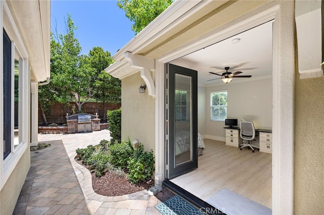 18 Beacon, Ladera Ranch, CA 92694 - entrance to property featuring stucco siding, area for grilling, ceiling fan, and a patio