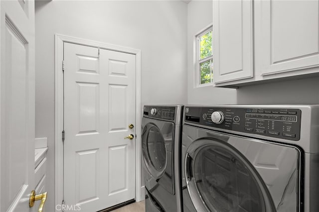 18 Beacon, Ladera Ranch, CA 92694 - washroom with washing machine and clothes dryer and cabinet space