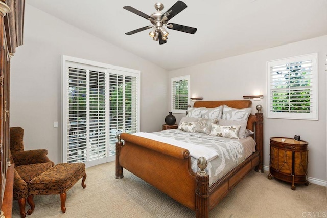 1034 Via Reata, Vista, CA 92081 - bedroom with access to exterior, vaulted ceiling, baseboards, light colored carpet, and a ceiling fan