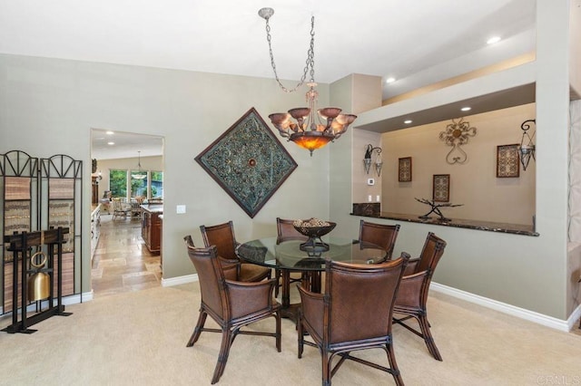 1034 Via Reata, Vista, CA 92081 - carpeted dining space with baseboards, an inviting chandelier, and recessed lighting