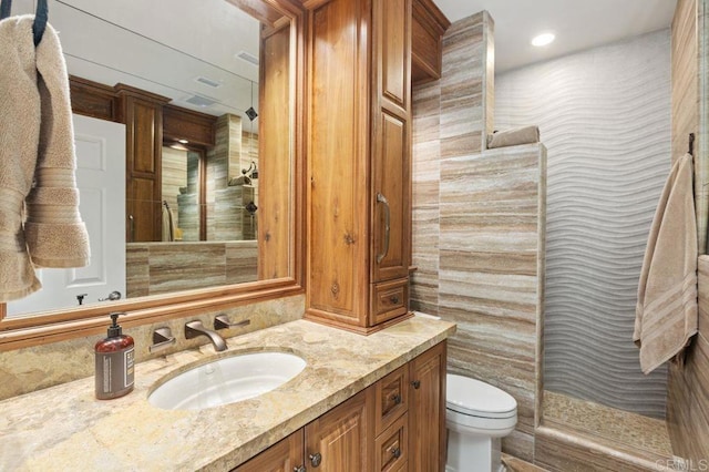 1034 Via Reata, Vista, CA 92081 - bathroom featuring recessed lighting, walk in shower, toilet, and vanity