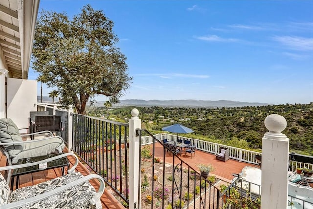 4612 Wolfe Way, Woodland Hills, CA 91364 - balcony featuring a mountain view and outdoor dining space