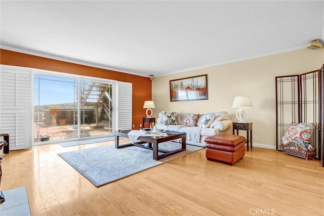 4612 Wolfe Way, Woodland Hills, CA 91364 - living room with crown molding, wood finished floors, and baseboards