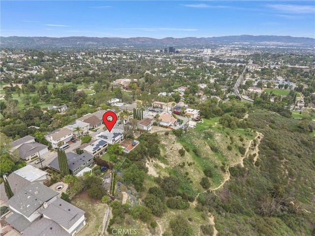 4612 Wolfe Way, Woodland Hills, CA 91364 - aerial view of property and surrounding area featuring a mountainous background and nearby suburban area
