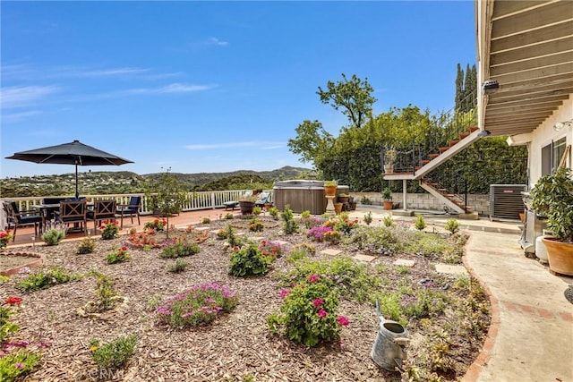 4612 Wolfe Way, Woodland Hills, CA 91364 - view of yard with a hot tub, a patio area, stairway, and central air condition unit