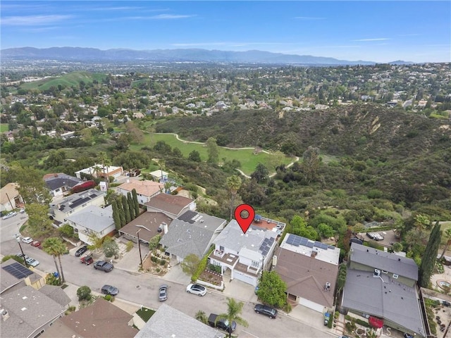 4612 Wolfe Way, Woodland Hills, CA 91364 - aerial view of property and surrounding area with a mountain backdrop and nearby suburban area
