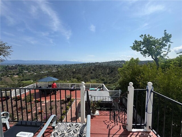 4612 Wolfe Way, Woodland Hills, CA 91364 - deck featuring a wooded view