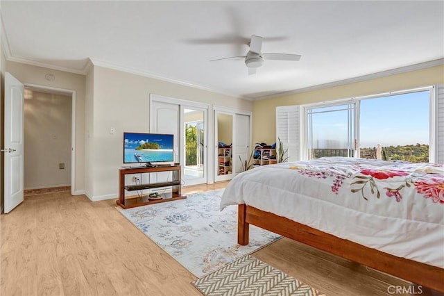 4612 Wolfe Way, Woodland Hills, CA 91364 - bedroom featuring multiple windows, access to outside, light wood-type flooring, ornamental molding, and baseboards