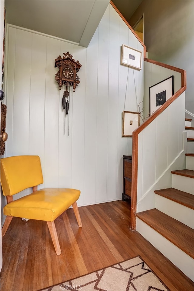 interior space featuring stairway and wood finished floors