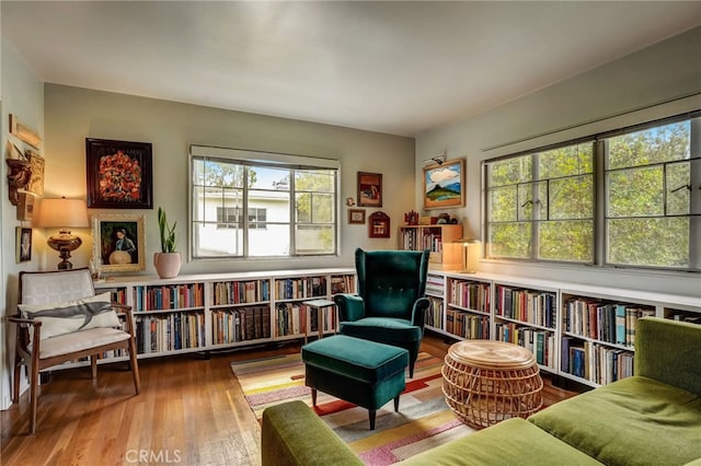 sitting room featuring wood finished floors