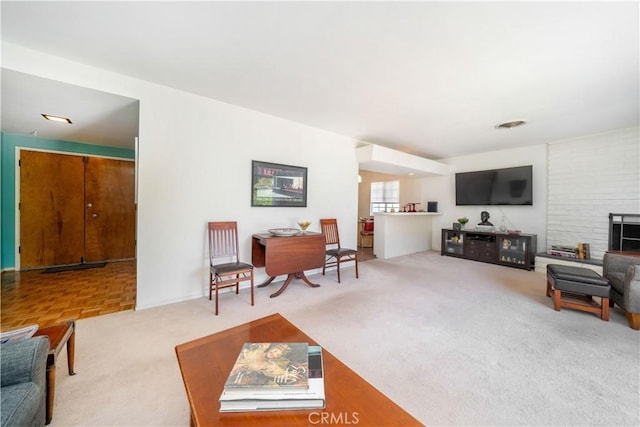 living area with carpet flooring