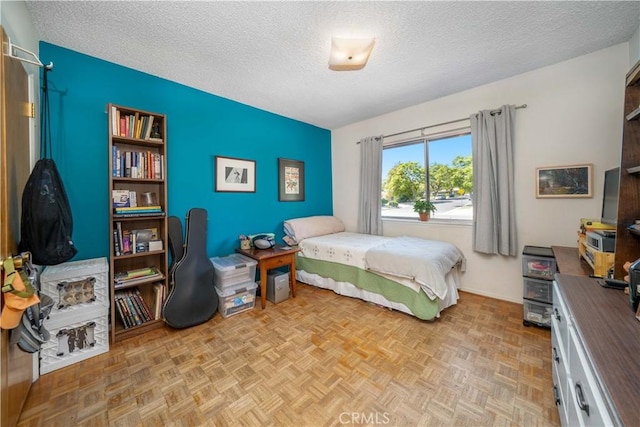bedroom with a textured ceiling